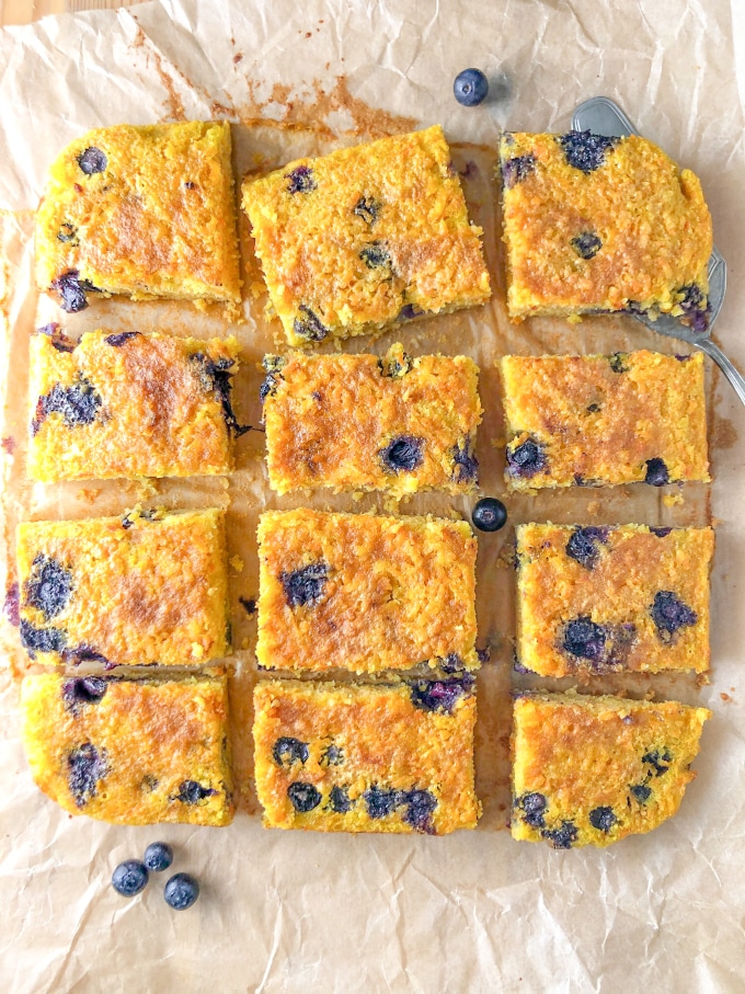 a square carrot and orange cake cut in squares