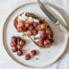 Roasted grapes, thyme and goats cheese on toast