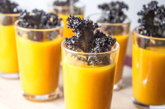 This Roasted pumpkin and carrot soup shooters with crispy kale chips recipe is the perfect thanksgiving appetizer